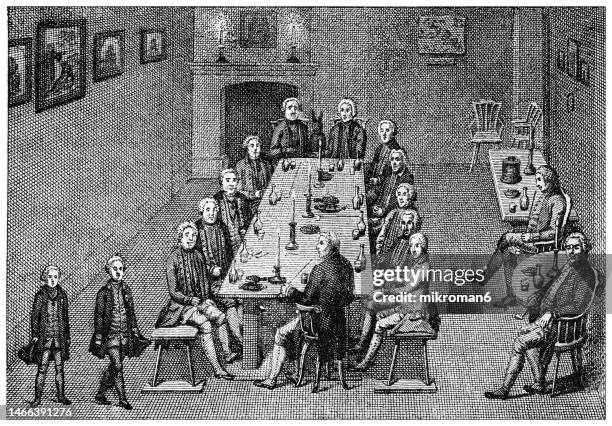 old engraved illustration of king frederick william i (14 august 1688 – 31 may 1740) and his court, evening meeting - festmahl stock-fotos und bilder