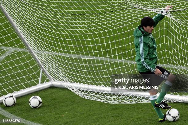 Germany's coach Joachim Loew takes part in a training session on June 21, 2012 at the PGE Arena in Gdansk, on the eve of the team's Euro 2012...