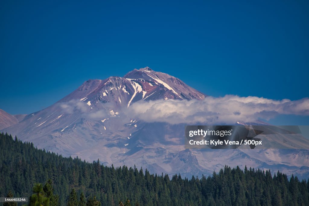 Scenic view of snowcapped mountains against blue sky,Mt Shasta,California,United States,USA