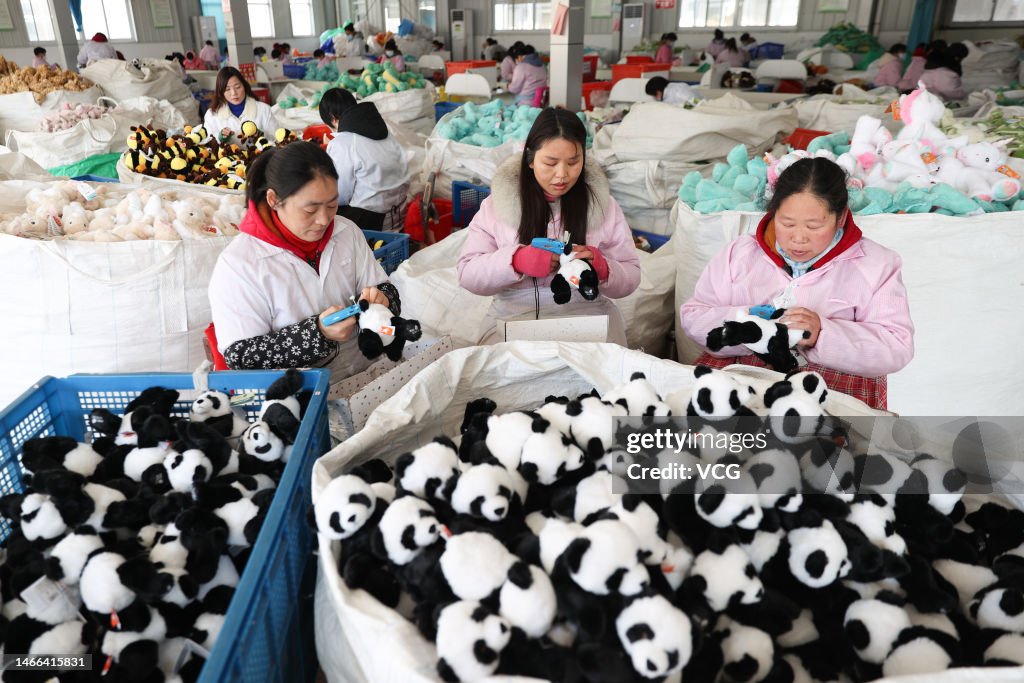 Toly Factory Employees produce stuffed toys for export at a toy factory on... News ...