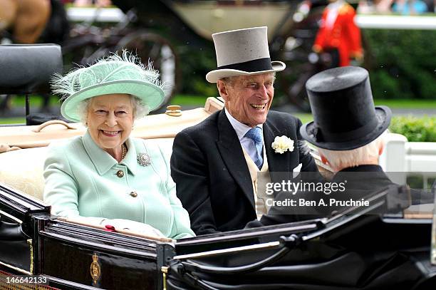 Queen Elizabeth II and Prince Philip, Duke of Edinburgh attends Ladies Day on day three of Royal Ascot at Ascot Racecourse on June 21, 2012 in Ascot,...