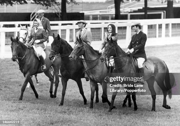 Members of the royal party ride around the racecourse at Ascot, prior to the Gold Cup day race, 19th June 1975. From left to right, the 10th Duke of...