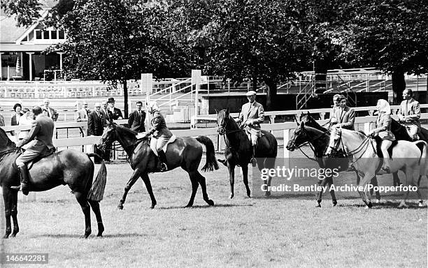 Members of the royal family on the course at Ascot, 20th June 1968. Amongst them are Queen Elizabeth II, Prince Charles and Katharine, Duchess of...