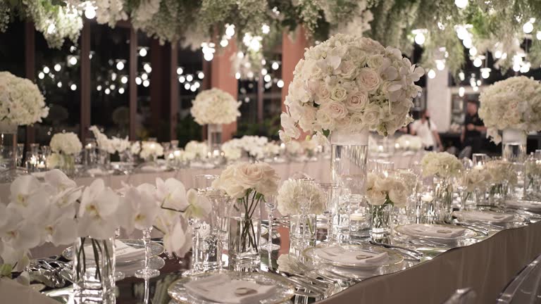 https://media.gettyimages.com/id/1466426016/video/dinner-setting-up-festive-table-decor-wedding-party-reception-at-night-in-garden.jpg?b=1&s=640x640&k=20&c=jbqZN73vFEud5LN0xJ0DrlXa_R6C0ePdEMQL95zu27Q=