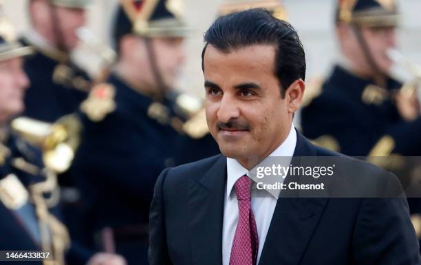 Qatar's Emir Sheikh Tamim bin Hamad al-Thani arrives at the Presidential Elysee Palace for a meeting with France's President Emmanuel Macron on...