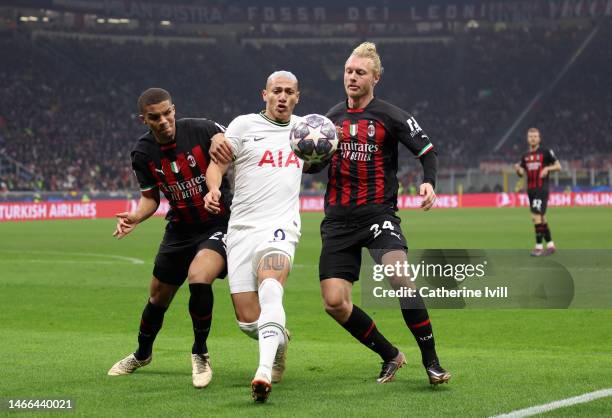 Richarlison of Tottenham Hotspur battles for possession with Malick Thiaw and Simon Kjaer of AC Milan during the UEFA Champions League round of 16...