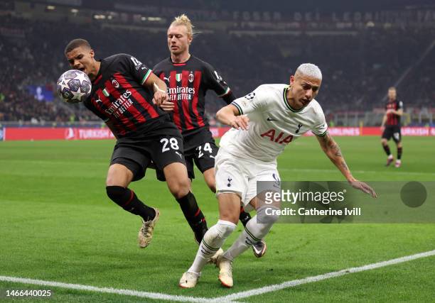Richarlison of Tottenham Hotspur battles for possession with Malick Thiaw and Simon Kjaer of AC Milan during the UEFA Champions League round of 16...