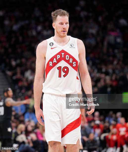Jakob Poeltl of the Toronto Raptors looks on against the Orlando Magic during the second half of their basketball game at the Scotiabank Arena on...