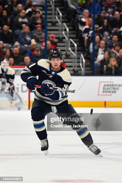 Kent Johnson of the Columbus Blue Jackets clears the puck during the first period of a game against the New Jersey Devils at Nationwide Arena on...