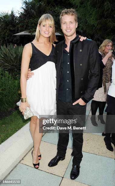 Isabella Calthorpe and Sam Branson attend the WTA Pre-Wimbledon Party presented by Dubai Duty Free at Kensington Roof Gardens on June 21, 2012 in...