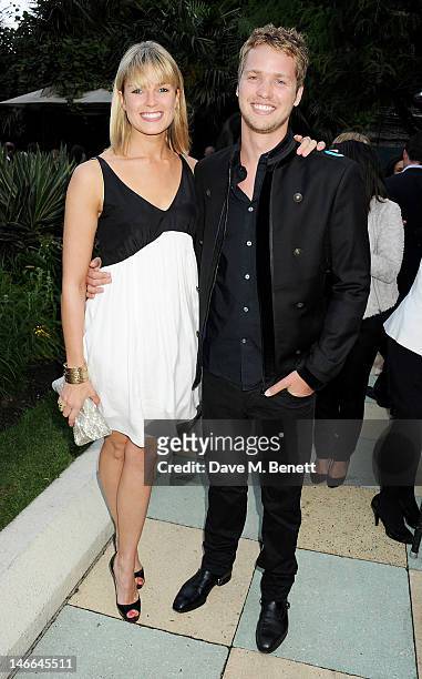 Isabella Calthorpe and Sam Branson attend the WTA Pre-Wimbledon Party presented by Dubai Duty Free at Kensington Roof Gardens on June 21, 2012 in...
