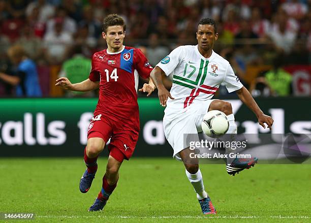 Vaclav Pilar of Czech Republic and Nani of Portugal battle for the ball during the UEFA EURO 2012 quarter final match between Czech Republic and...