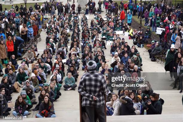 Current and former students from Michigan State University and their supporters attend a rally outside of the state Capitol Building on February 15,...