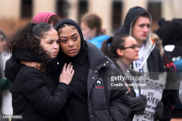 Current and former students from Michigan State University and their supporters attend a rally outside of the state Capitol Building on February 15,...