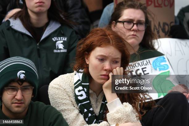 Current and former students from Michigan State University and their supporters attend a rally outside of the state Capitol Building on February 15,...