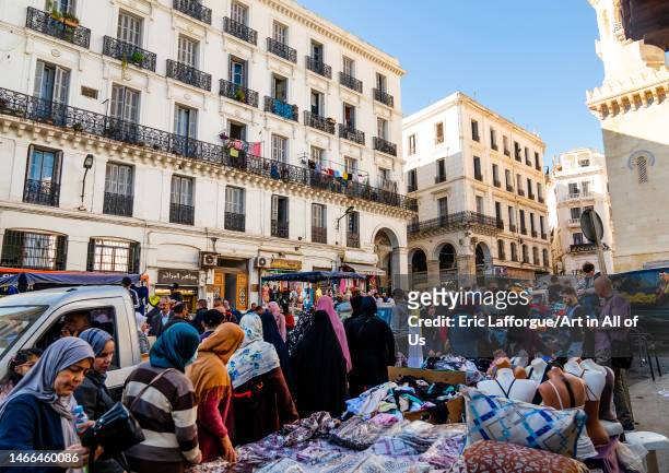 Market in front of old french colonial buildings, North Africa, Algiers, Algeria on December 25, 2022 in Algiers, Algeria.