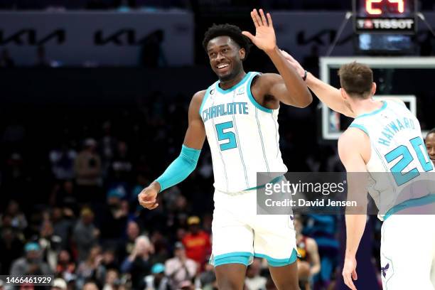 Mark Williams of the Charlotte Hornets celebrates with Gordon Hayward after making a basket during the fourth period of a basketball game against the...