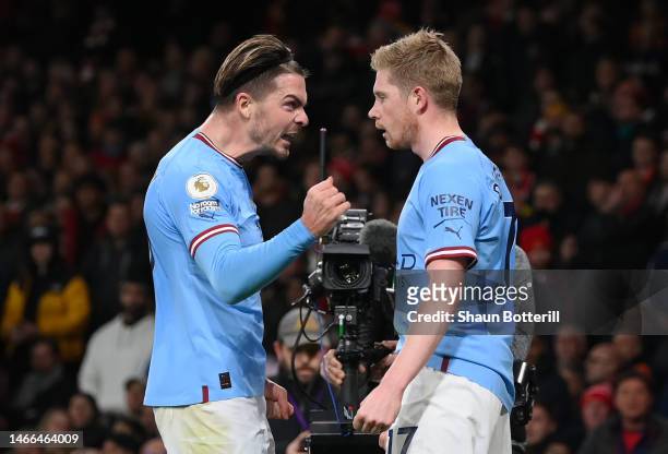 Kevin De Bruyne of Manchester City celebrates with teammate Jack Grealish after scoring the team's first goal during the Premier League match between...