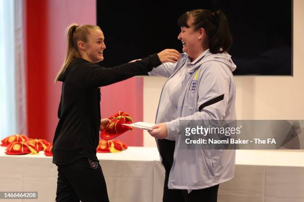 Mo Marley and Georgia Stanway of England interact during a presentation of England caps and legacy numbers at St George's Park on February 15, 2023...