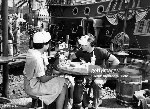 Actor Tony Curtis and actress Suzanne Pleshette in a scene of "40 Pounds of Trouble" at the Disneyland Resort in Anaheim, California, in 1962