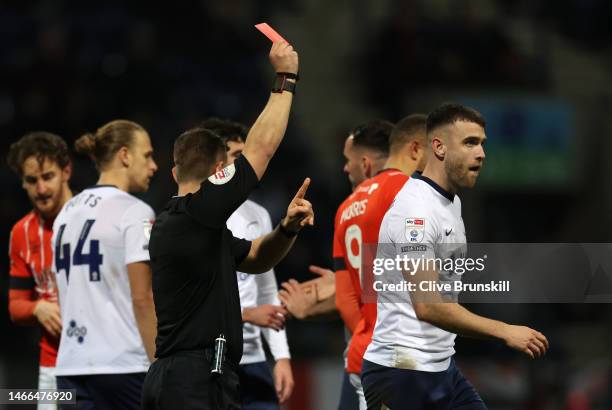 Ben Whiteman of Preston North End is shown a red card from Match Referee Josh Smith during the Sky Bet Championship between Preston North End and...