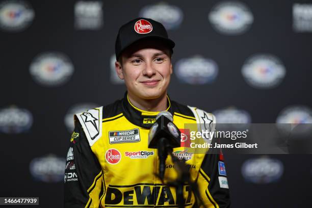 Christopher Bell, driver of the DeWalt/Rheem Toyota, speaks to the media during the NASCAR Cup Series 65th Annual Daytona 500 Media Day at Daytona...