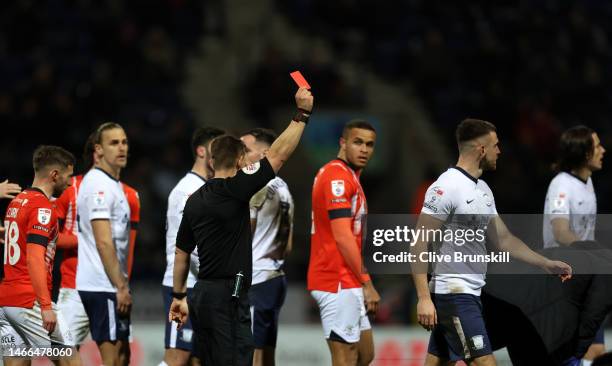 Ben Whiteman of Preston North End is shown a red card from Match Referee Josh Smith during the Sky Bet Championship between Preston North End and...