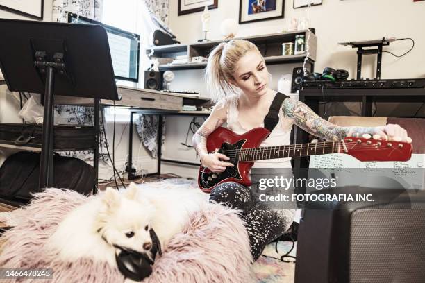 female musician practising at home - best sound editing bildbanksfoton och bilder