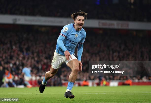 Jack Grealish of Manchester City celebrates after scoring the team's second goal during the Premier League match between Arsenal FC and Manchester...