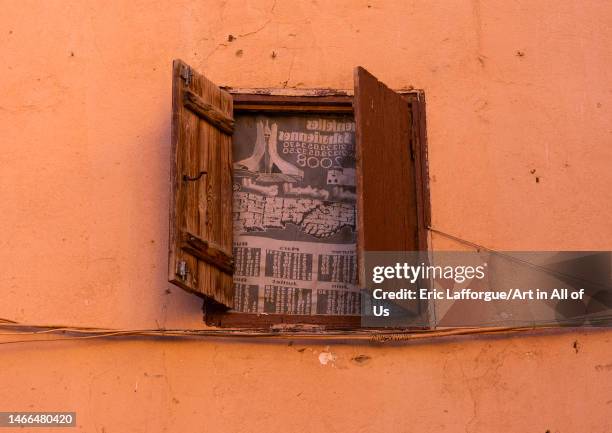 Window with a curtain in Ksar El Atteuf, North Africa, Ghardaia, Algeria on January 4, 2023 in Ghardaia, Algeria.