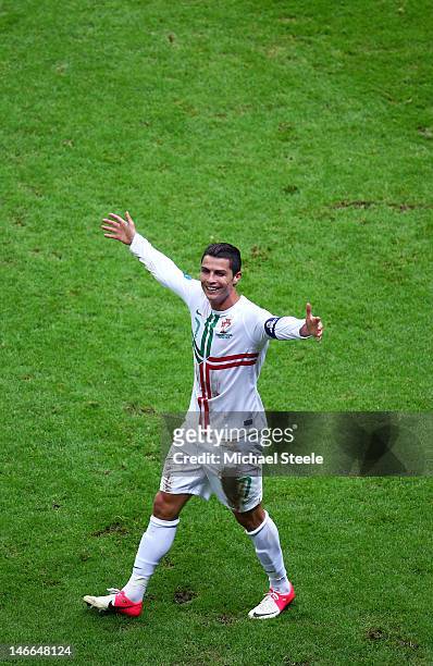 Cristiano Ronaldo of Portugal celebrates scoring the opening goal with a header during the UEFA EURO 2012 quarter final match between Czech Republic...
