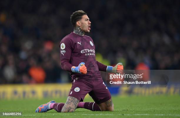 Ederson of Manchester City celebrates after Erling Haaland of Manchester City scores their side's third goal during the Premier League match between...