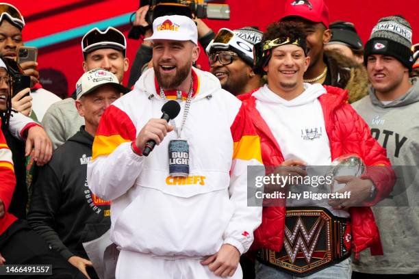 Travis Kelce and Patrick Mahomes of the Kansas City Chiefs celebrate on stage during the Kansas City Chiefs Super Bowl LVII victory parade on...