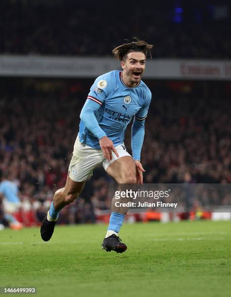 Jack Grealish of Manchester City celebrates scoring the team's second goal during the Premier League match between Arsenal FC and Manchester City at...