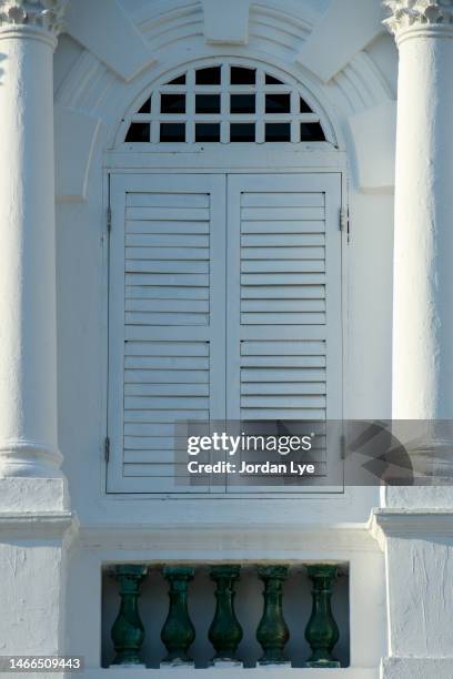 colonial design window with white color - malaysia architecture stock-fotos und bilder