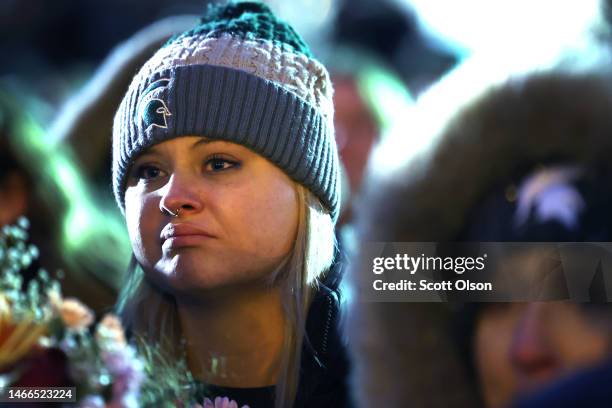 Students, faculty and others in the community attend a vigil on the campus of Michigan State University following Monday's shooting on February 15,...