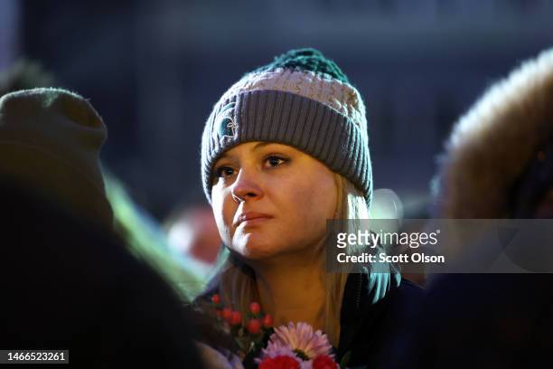 Students, faculty and others in the community attend a vigil on the campus of Michigan State University following Monday's shooting on February 15,...