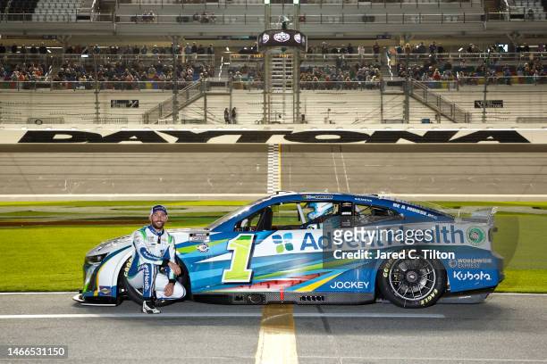 Ross Chastain, driver of the AdventHealth Chevrolet, poses on the track during qualifying for the Busch Light Pole at Daytona International Speedway...