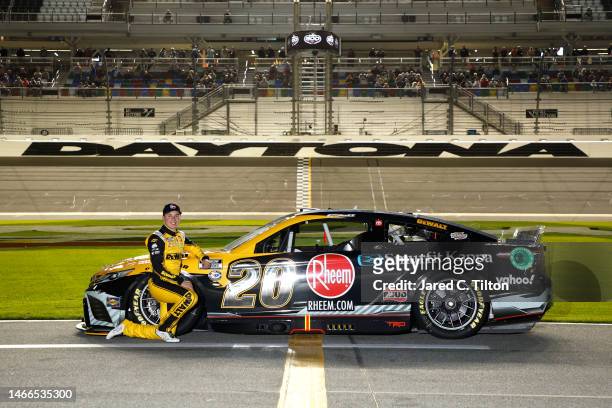 Christopher Bell, driver of the DeWalt/Rheem Toyota, poses on the track during qualifying for the Busch Light Pole at Daytona International Speedway...