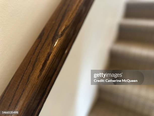 wooden handrail along staircase - fall prevention stock-fotos und bilder