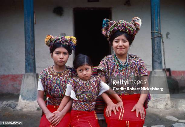 Portrait of, from left, 12-year-old Josefa Cedillo Marcos, her cousin, 6-year-old Juana Cedillo Perez , and her mother , Nebaj, Guatemala, January...