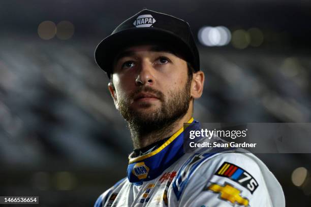 Chase Elliott, driver of the NAPA Auto Parts Chevrolet, looks on during qualifying for the Busch Light Pole at Daytona International Speedway on...