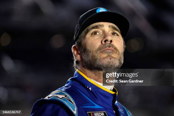 Jimmie Johnson, driver of the Carvana Chevrolet, looks on during qualifying for the Busch Light Pole at Daytona International Speedway on February...