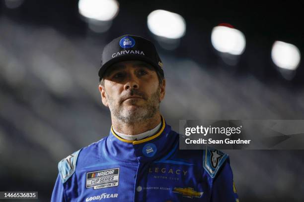 Jimmie Johnson, driver of the Carvana Chevrolet, looks on during qualifying for the Busch Light Pole at Daytona International Speedway on February...