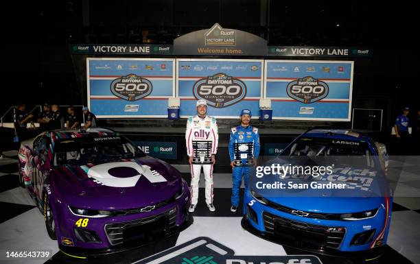 Pole Award winner, Alex Bowman, driver of the Ally Chevrolet, and Front Row winner, Kyle Larson, driver of the HendrickCars.com Chevrolet, pose for...