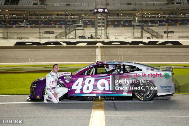 Alex Bowman, driver of the Ally Chevrolet, poses on the track during qualifying for the Busch Light Pole at Daytona International Speedway on...