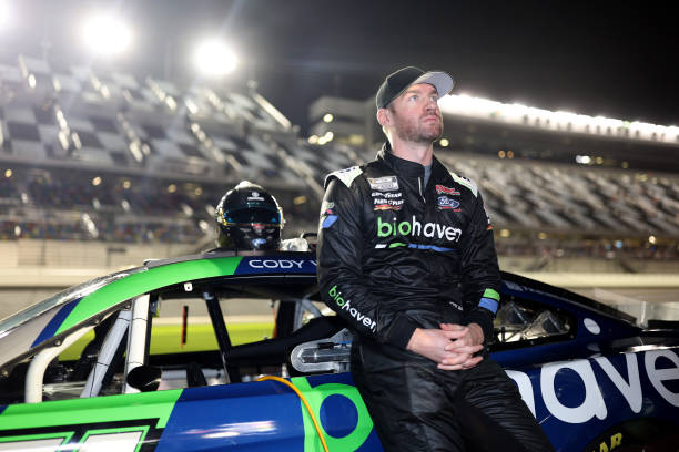 Cody Ware, driver of the Biohaven/Jacob Co. Ford, looks on during qualifying for the Busch Light Pole at Daytona International Speedway on February...