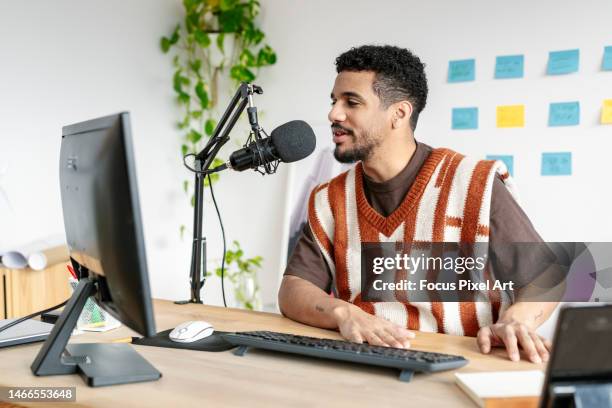 young entrepreneur recording a podcast. - radio station stock pictures, royalty-free photos & images