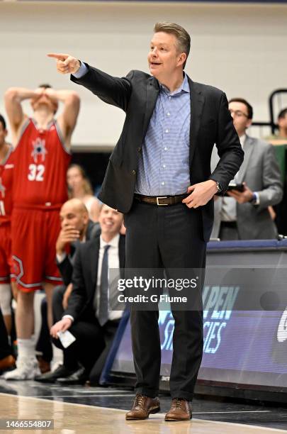 Head coach Chris Mooney of the Richmond Spiders watches the game against the George Washington Colonials at Charles E. Smith Athletic Center on...