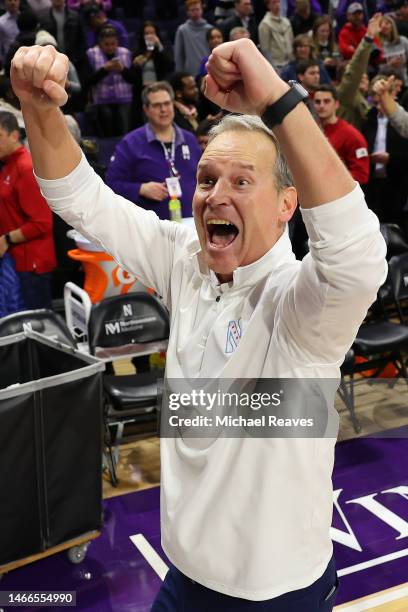 Head coach Chris Collins of the Northwestern Wildcats celebrates after defeating the Indiana Hoosiers 64-62 at Welsh-Ryan Arena on February 15, 2023...